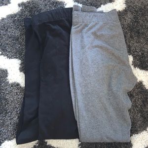 2 pairs of small black leggings from garage. One pair of small gray leggings.